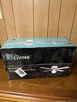 Boxed unopened For Living 42 inch ceiling fan with light in original packaging