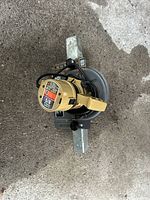 Top view of the Black & Decker router showing the motor label, cord, and base plate.