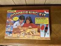 Closed box with front view showing brand, item name, and images explaining kit contents and usage.