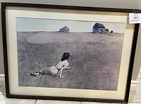 Full view of framed print showing woman lying in grass with farmhouse on horizon