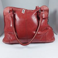Front view of vintage Danier handbag showing overall structure, leather condition, and strap design.