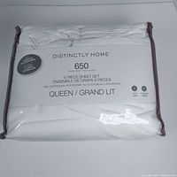 Packaged Distinctly Home 6 Piece Queen Size Sheet Set with 650 thread count made of 55% cotton and 45% polyester.