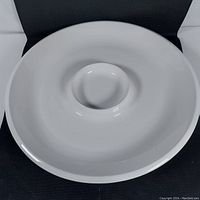 Top view of the full white snack and dip platter showing the entire 14 inch diameter circular shape with central dip bowl.