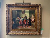 Full frontal view of oil painting in gilded frame and picture light attached