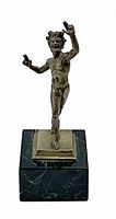 Full front view of bronze faun on marble base