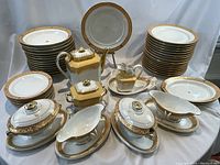 Front view of entire set arranged on table against white backdrop