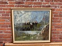Full view of framed oil painting showing horse race scene