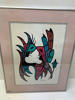 Framed acrylic painting showing the entire artwork with a stylized indigenous design and light pink matting.