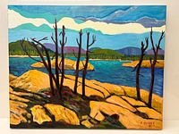 Front view of the oil painting showing the full colorful landscape scene with trees and rocky shore, signed lower right.