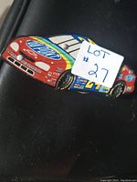 Top angled view of the racecar model showing detailed racing decals and number 24.