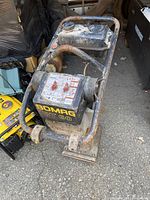 Front angle showing control panel, model decal and fuel tank