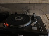 Full view of Kenwood KD-3070 turntable with platter, tonearm and dust cover open