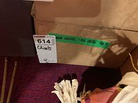 Box labeled with green tape 'WOOD CHISEL - #A-2036 3/8"' and auction label showing 'Chisels'