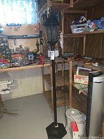 Full view of the lamp showing height and base design.