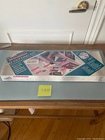 Photo of Logan Do-It-Yourself Mat Cutting Kit box, model 525, packaging with branding and promotional text