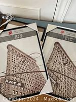 Two black poster frames still sealed in original packaging showing an image of Flatiron building labeled Mainstays, size 12x18 inches/30x46 cm