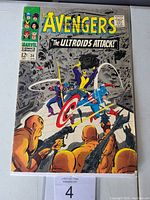 Front cover of Avengers #36 Marvel comic book in plastic sleeve depicting 'The Ultroids Attack!' with characters like Captain America and Hawkeye, price 12 cents