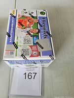 Sealed retail box of 2022 Panini Chronicles Draft Picks basketball trading cards, showing front and top with player images and branding seals.