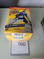 Sealed 2021-22 Upper Deck Extended Series hockey blaster box showing front with promotional text and player image