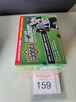 Sealed unopened blaster box of 2021-22 Upper Deck Hockey Series Two trading cards with visible branding and player image