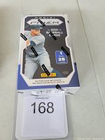 Sealed unopened box of 2021 Panini Prizm Baseball cards with player image and branding visible.