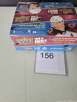 Sealed retail box of 2020-21 Upper Deck Extended Series hockey cards with 24 packs inside