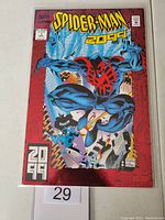 Spider-Man 2099 #1 Marvel comic book in protective sleeve, showing front cover with distinctive Spider-Man 2099 character.