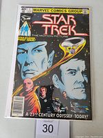 Front cover of Star Trek #1 comic book from Marvel Comics Group with price 40 cents and first issue statement.