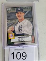 Front view of Aaron Judge Topps Chrome Platinum Anniversary baseball card in protective case, showing player photo, team logo, and facsimile autograph.
