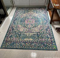 Full view of La Dole Timeless area rug showing overall pattern and colors