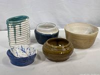 Overview of all five ceramic pieces by Diana Swalen showing the variety in size and glaze colors and styles