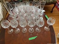 Overview of all stemware types including champagne, pilsner, wine, and balloon glasses arranged on table