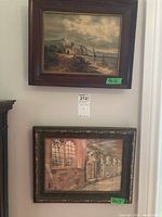 Two framed antique paintings hung on a wall showing one above the other, dimensions labeled 9x12 and 9x13.