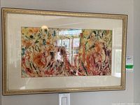 Full view of framed abstract painting showing overall composition, frame and mat