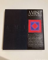 Front view of book in slipcase showing title and quilt image on dust jacket