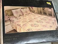 Package of a double size sheet set with floral print shown on front.