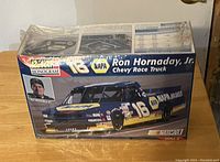 Box of Ron Hornaday Jr. NASCAR Chevy Race Truck plastic model kit by Monogram in new condition.
