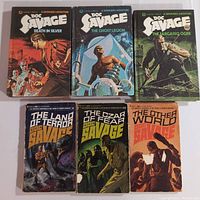 Six vintage Doc Savage books, three hardback and three softcover, laid out showing front cover art and titles.