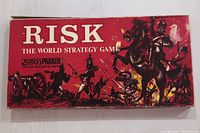 Top view of vintage red Risk box with medieval battle artwork and Parker branding