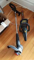 Yardworks 18 inch hedge trimmer with black and yellow body, protective hand guard, and metal blade