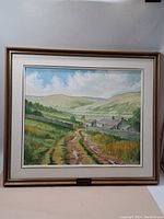 Front view of the framed oil on canvas landscape painting titled 'Swaledale'. Shows the overall artwork and frame.
