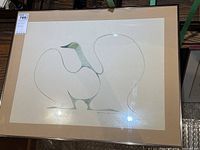 Full view of the framed Indigenous bird art print showing the entire piece with beige mat and thin frame.