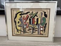 Frontal view of framed pochoir lithograph showing full composition and frame