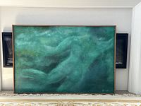 Front view of the framed painting showing abstract green composition.