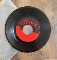 7 inch vinyl record with Atlantic Records label for Led Zeppelin's Black Dog single.