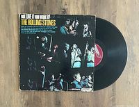 Front photo of The Rolling Stones "Got LIVE If You Want It!" album showcasing the original 1966 mono pressing vinyl record and front cover with live performance images.