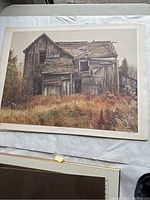 Full view of the lithograph depicting aged wooden house with detailed structural features and surrounding grass.