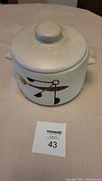 Top view of the 1972 vintage West Bend bean pot casserole with lid and mid century design on side.