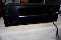 Front view of Onkyo receiver on padded surface