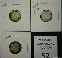 Obverse and reverse view of 1903 H, 1913, and 1919 Canadian silver dimes in white coin holders, showing dates and main designs.